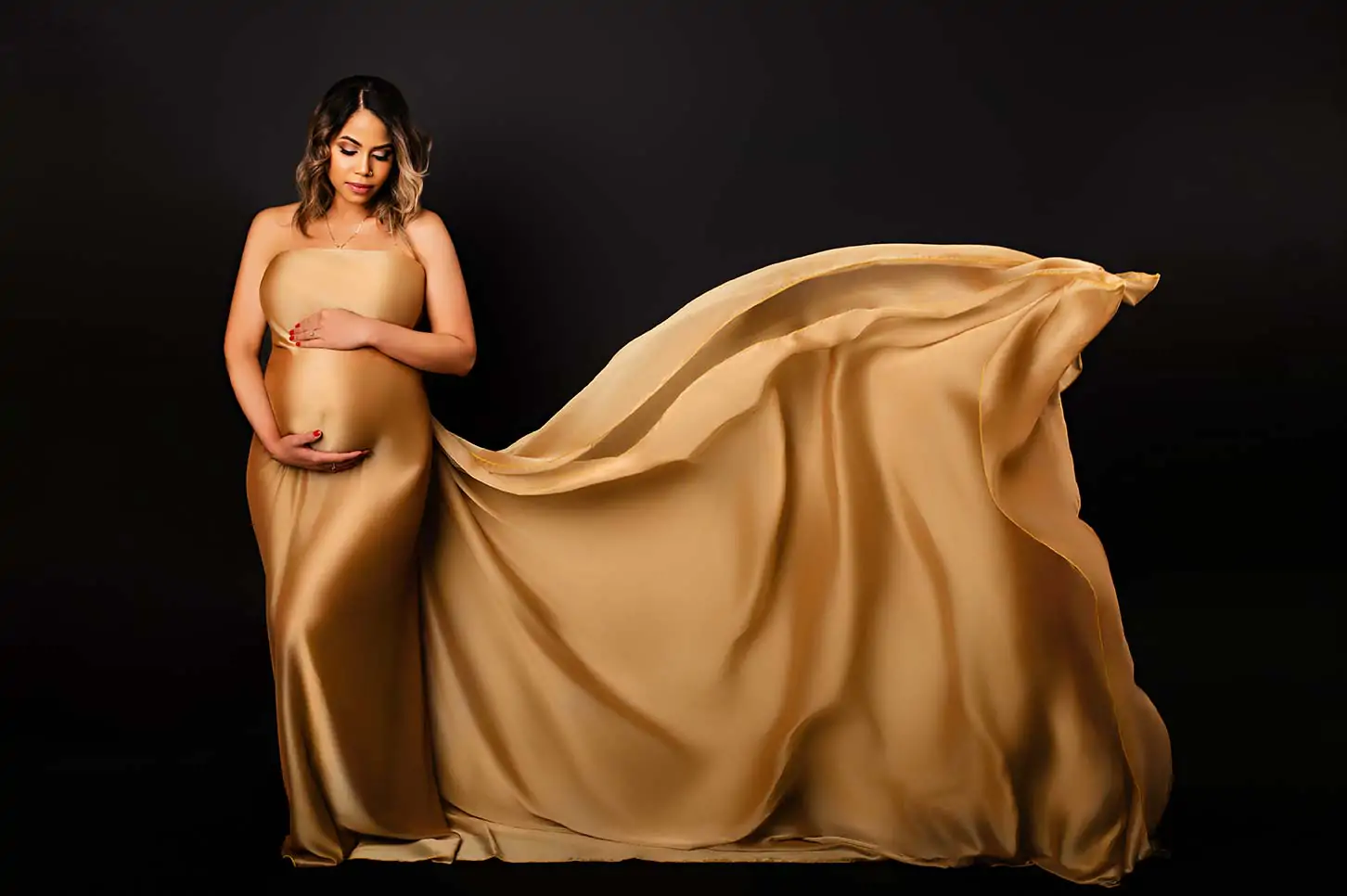 Pregnant woman in studio quality maternity photoshoot at home in NYC, professional newborn photography session